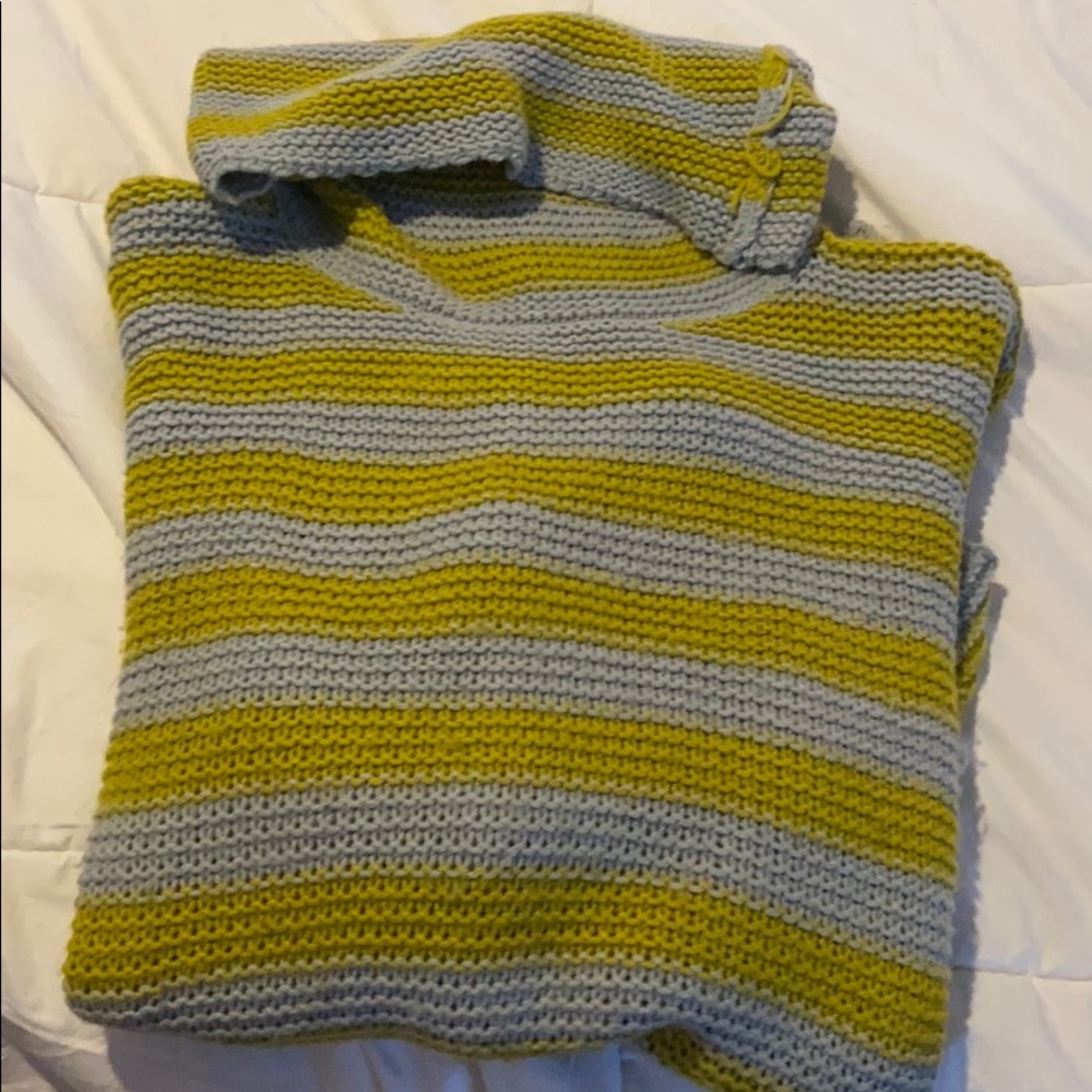 Grey and yellow turtleneck asymmetrical on bottom.